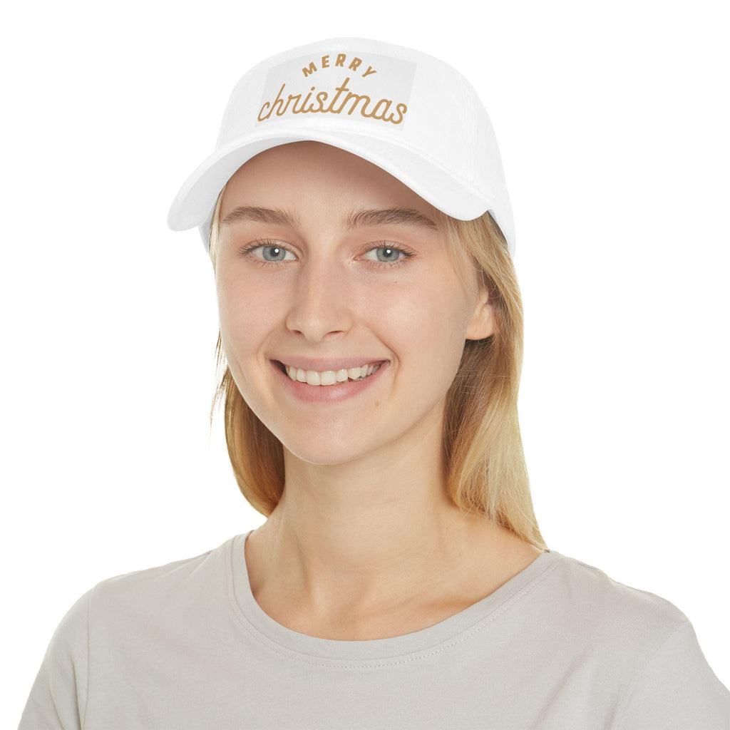 Person wearing a white cap with 'Merry Christmas' text on a white background